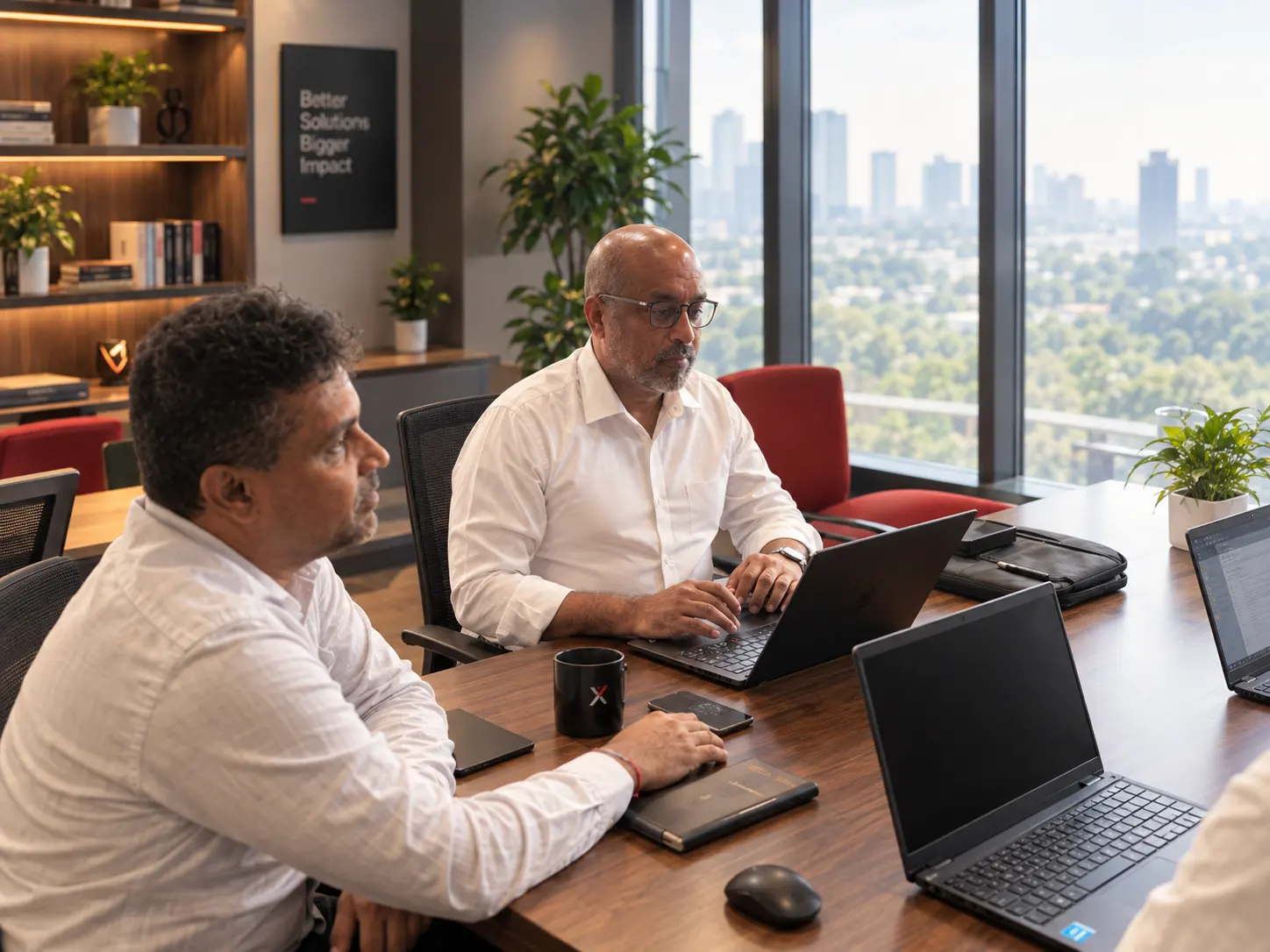 Team reviewing BPO operations around a meeting table